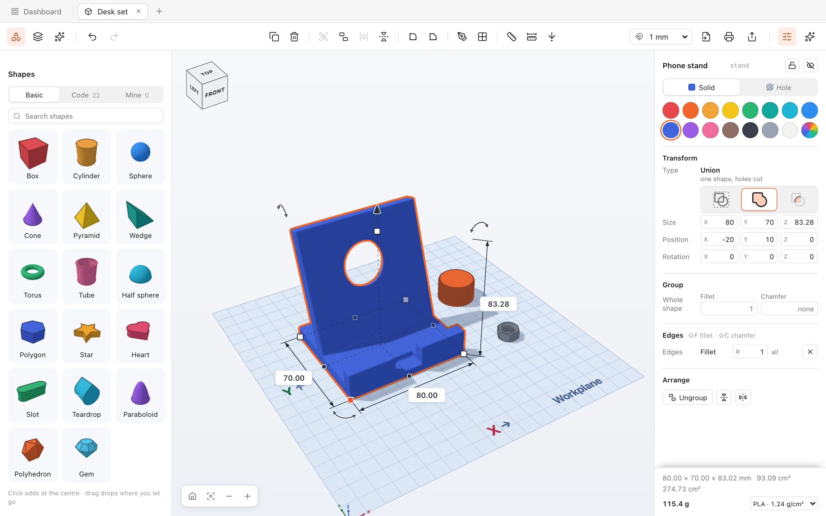 Kloss's window: tabs, the Shapes panel, the toolbar, a phone stand selected on the workplane with its sizes, and its Properties.